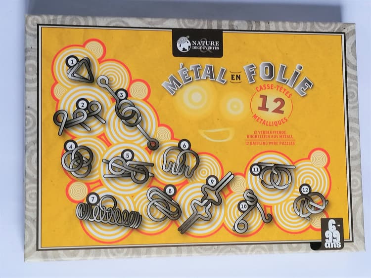 Boîte du jeu : Métal en folie 12 casse-têtes métalliques